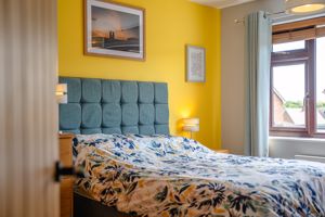 Bedroom One- click for photo gallery